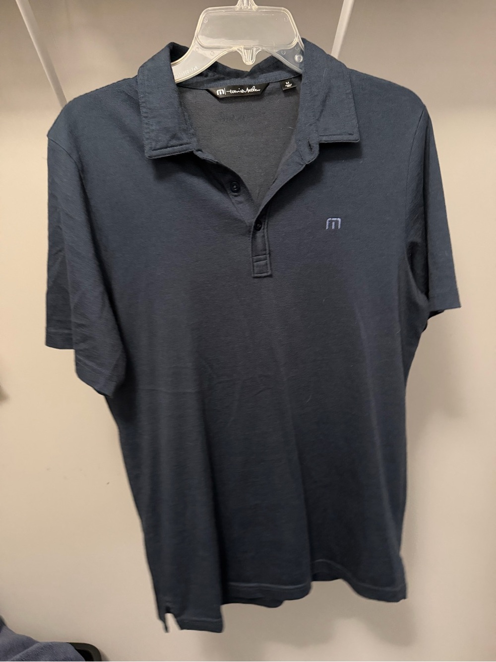 Travis Mathew Men's Dark Navy Polo with Subtle Logo